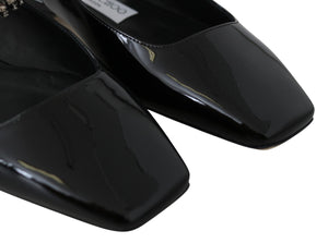 Elegante schwarze Lack-Flats mit Kristall-Akzent