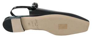 Elegante schwarze Lack-Flats mit Kristall-Akzent