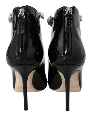 Elegante schwarze Lackstiefel mit Absatz