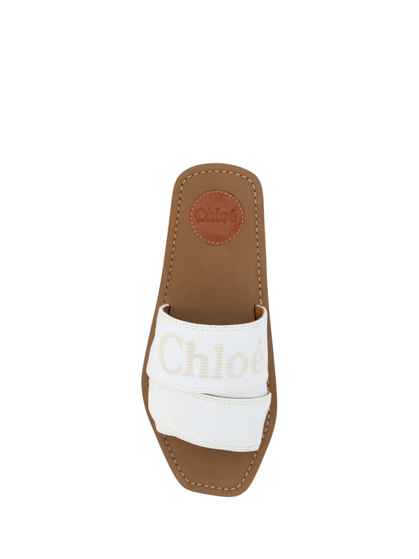 Elegante weiße Gleitsandalen aus Baumwolle
