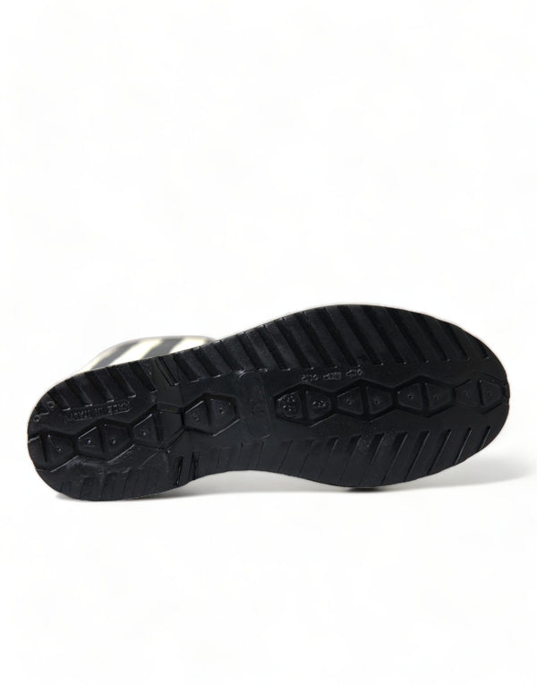 Schwarze kniehohe flache Gummistiefel Schuhe