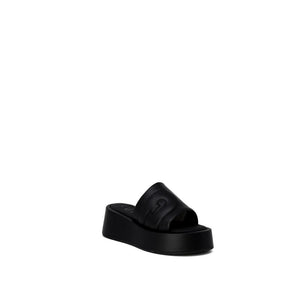 Schwarze Leder-Pantoffeln