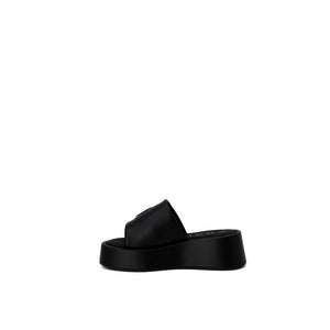 Schwarze Leder-Pantoffeln