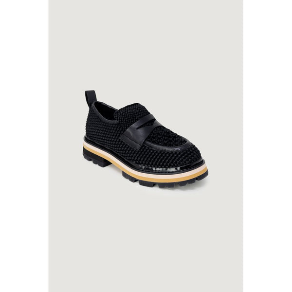Schwarze Leder-Plateau-Pumps