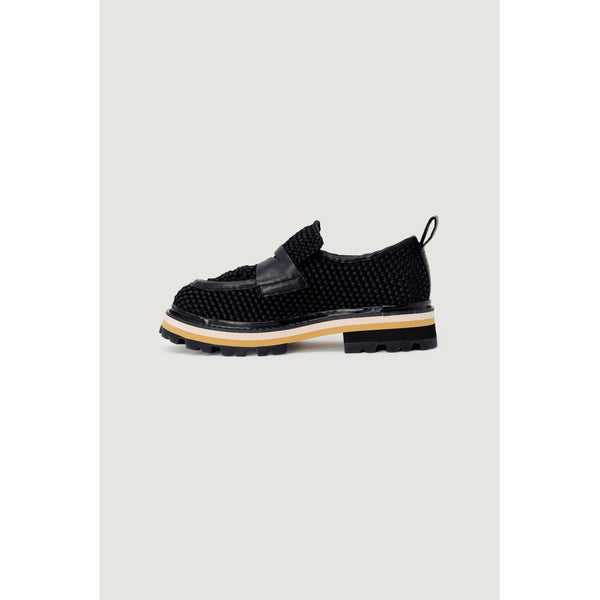Schwarze Leder-Plateau-Pumps