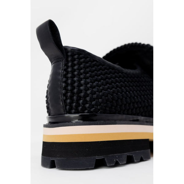 Schwarze Leder-Plateau-Pumps
