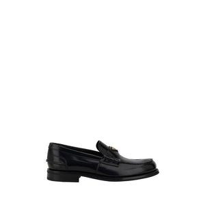 Schwarze Kalbsleder-Bos-Taurus-Slipper