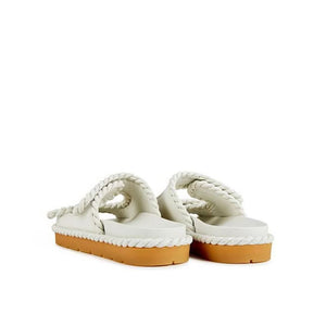 Flache Sandalen aus weißem Lammleder