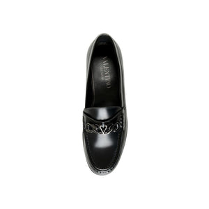 Elegante schwarze Lederslipper