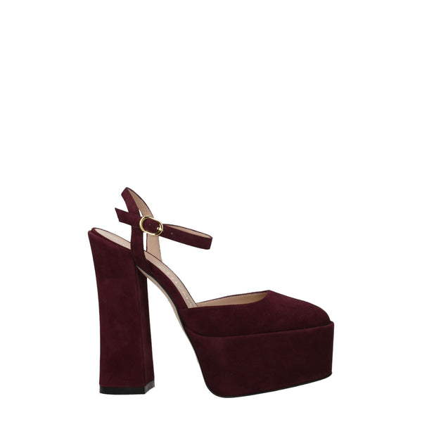 Rote Ledersandalen mit Plateauabsatz