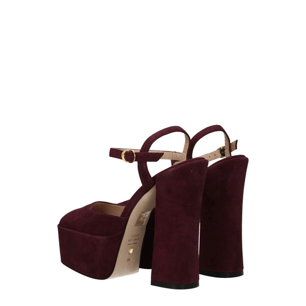 Rote Ledersandalen mit Plateauabsatz