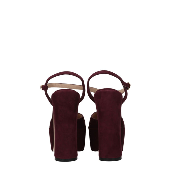 Rote Ledersandalen mit Plateauabsatz