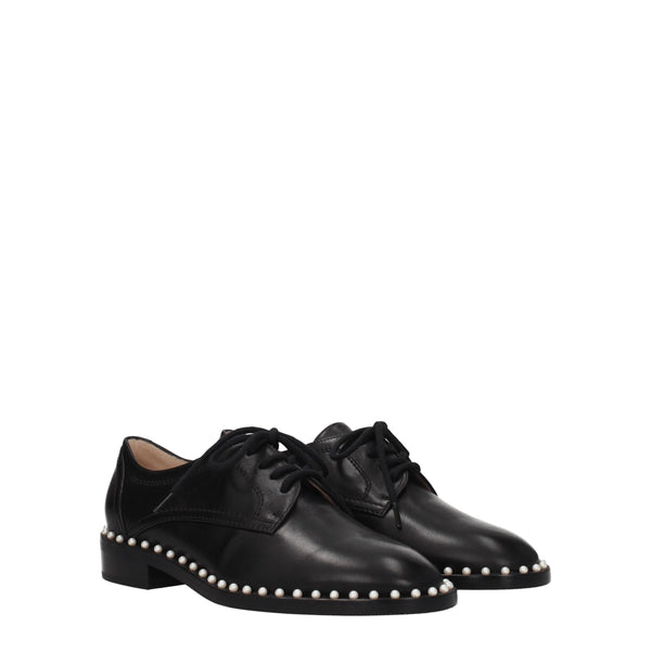 Schwarze Leder Oxfords und Derbies