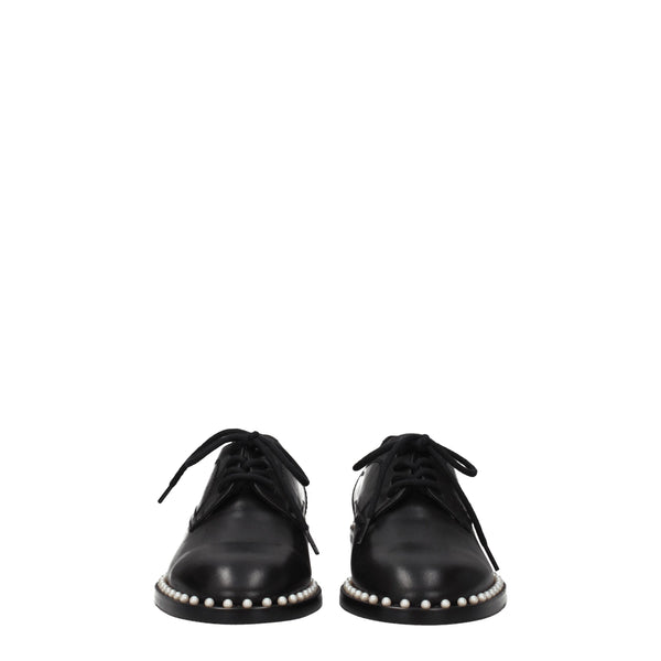 Schwarze Leder Oxfords und Derbies
