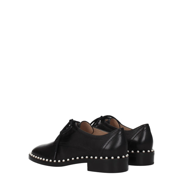 Schwarze Leder Oxfords und Derbies