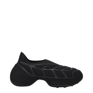 Slipper aus schwarzem Stoff