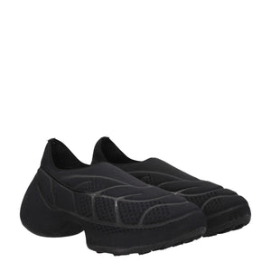 Slipper aus schwarzem Stoff