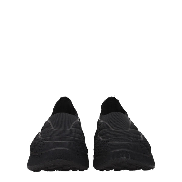 Slipper aus schwarzem Stoff