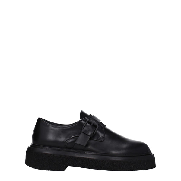 Schwarze Leder Oxfords und Derbies