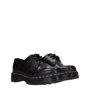 Schwarze Leder Oxfords und Derbies