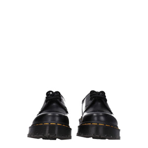 Schwarze Leder Oxfords und Derbies