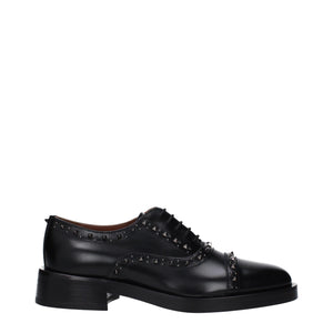 Schwarze Leder Oxfords und Derbies