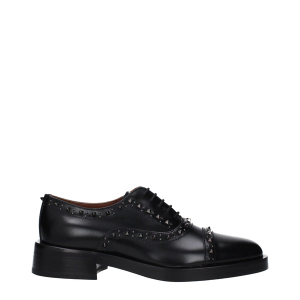 Schwarze Leder Oxfords und Derbies