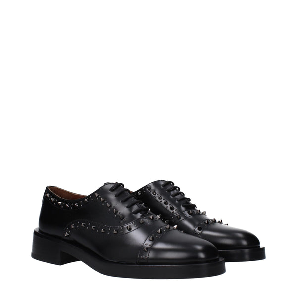 Schwarze Leder Oxfords und Derbies