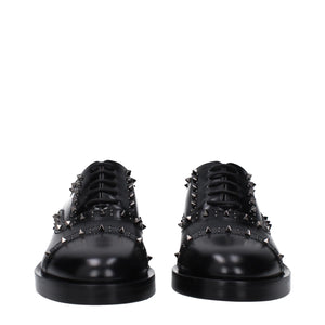 Schwarze Leder Oxfords und Derbies