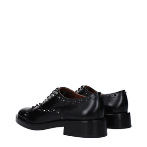 Schwarze Leder Oxfords und Derbies