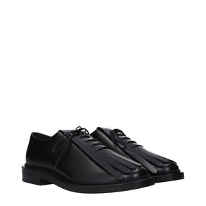 Schwarze Leder Oxfords und Derbies