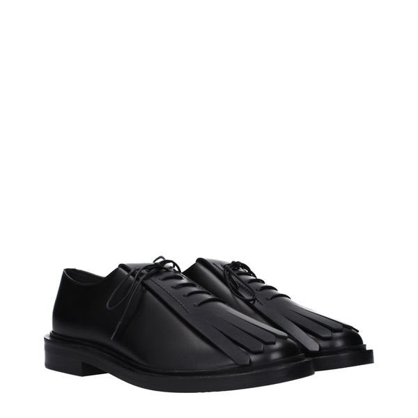 Schwarze Leder Oxfords und Derbies