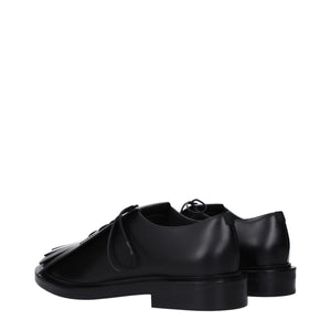 Schwarze Leder Oxfords und Derbies