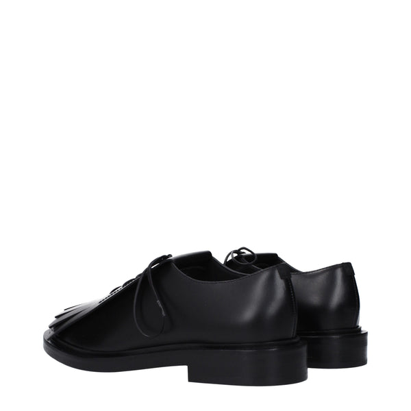 Schwarze Leder Oxfords und Derbies