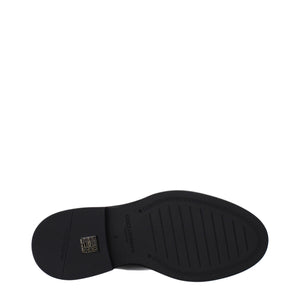 Schwarze Lederstiefeletten