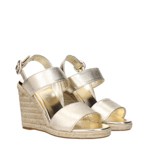 Goldene Leder-Keilsandalen