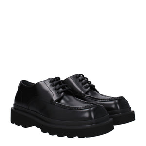 Schwarze Leder Oxfords und Derbies