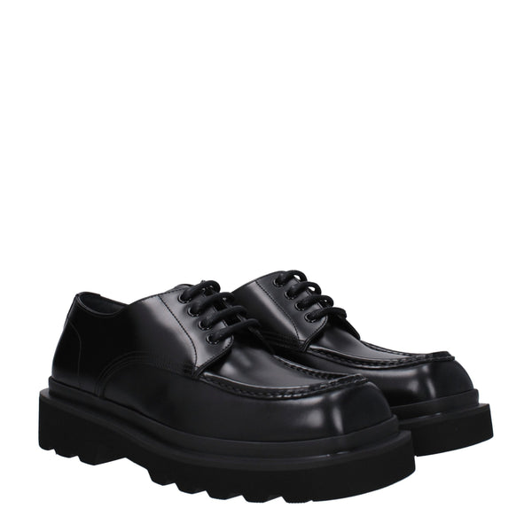 Schwarze Leder Oxfords und Derbies