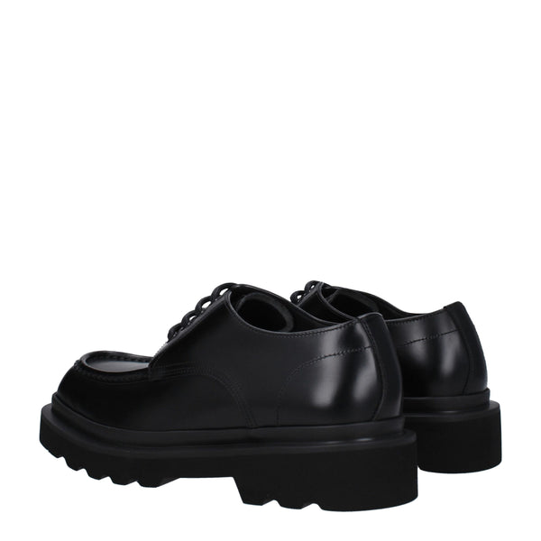 Schwarze Leder Oxfords und Derbies