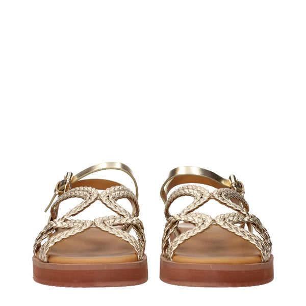 Goldene Polyethylen-Sandalen