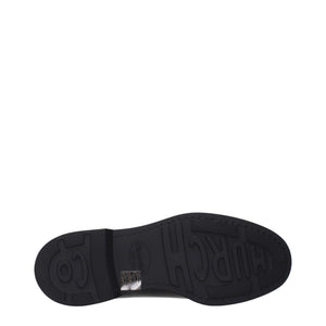Schwarze Leder Oxfords und Derbies