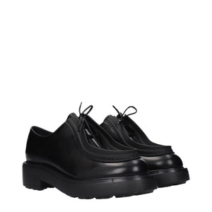 Schwarze Leder Oxfords und Derbies