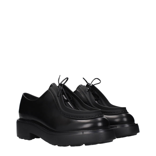 Schwarze Leder Oxfords und Derbies