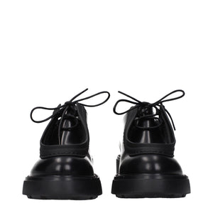Schwarze Leder Oxfords und Derbies