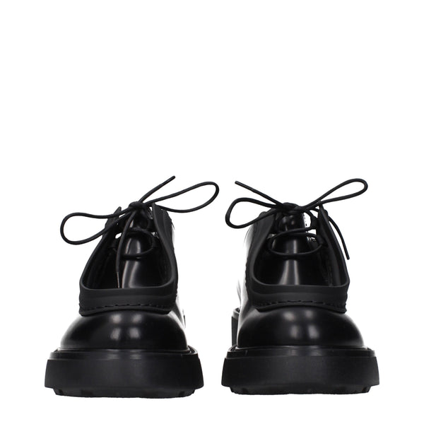 Schwarze Leder Oxfords und Derbies