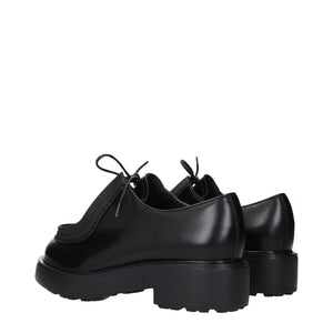 Schwarze Leder Oxfords und Derbies