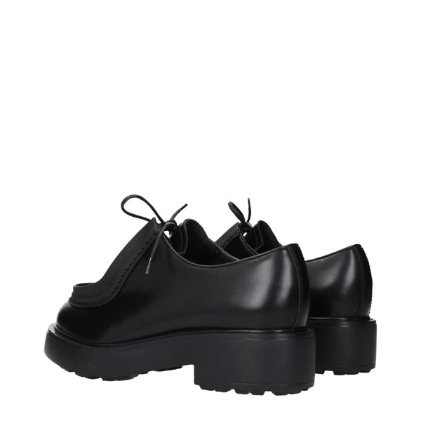 Schwarze Leder Oxfords und Derbies