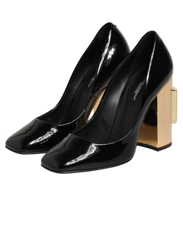 Schwarze Goldfarbene Lackleder-Logo-Pumps
