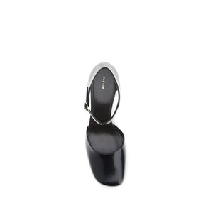 Schwarze Gummipumps mit Mittelabsatz