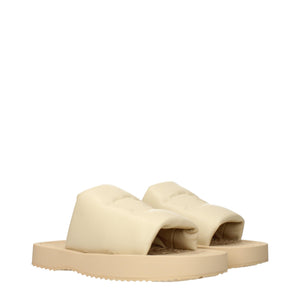 Beigefarbene Lederslipper